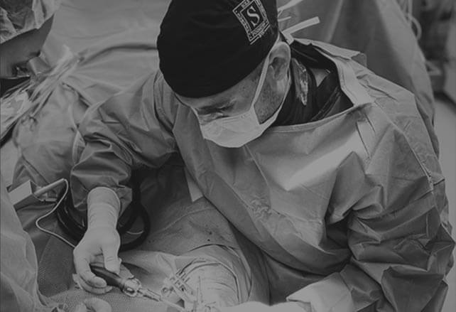 Doctor preforming surgery